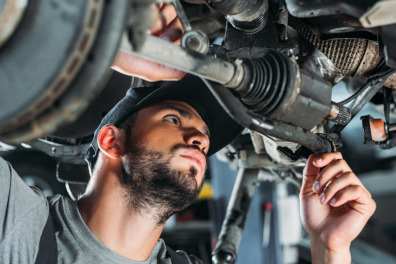 Mechanic Inspection a car's underside