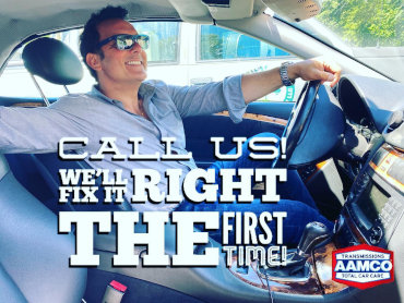 Man looking happy, clean, and dry inside a vehicle with sunglasses on with the words, "Call Us! We'll fix it right the first time!" with an AAMCO brand logo.